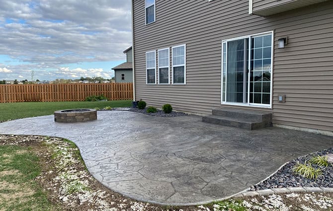 stamped concrete patio in a backyard in chatham illinois
